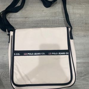 White and black polo side bag